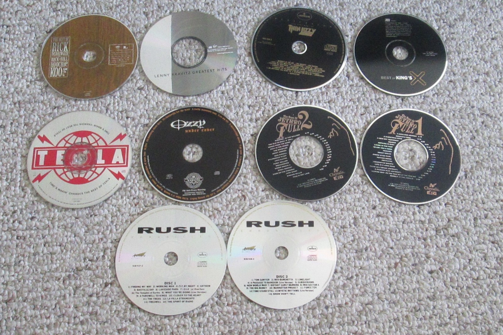 Lot of 10 GREATEST HITS BEST OF Rock Albums OZZY RUSH DERRINGER KRAVITZ TESLA NM