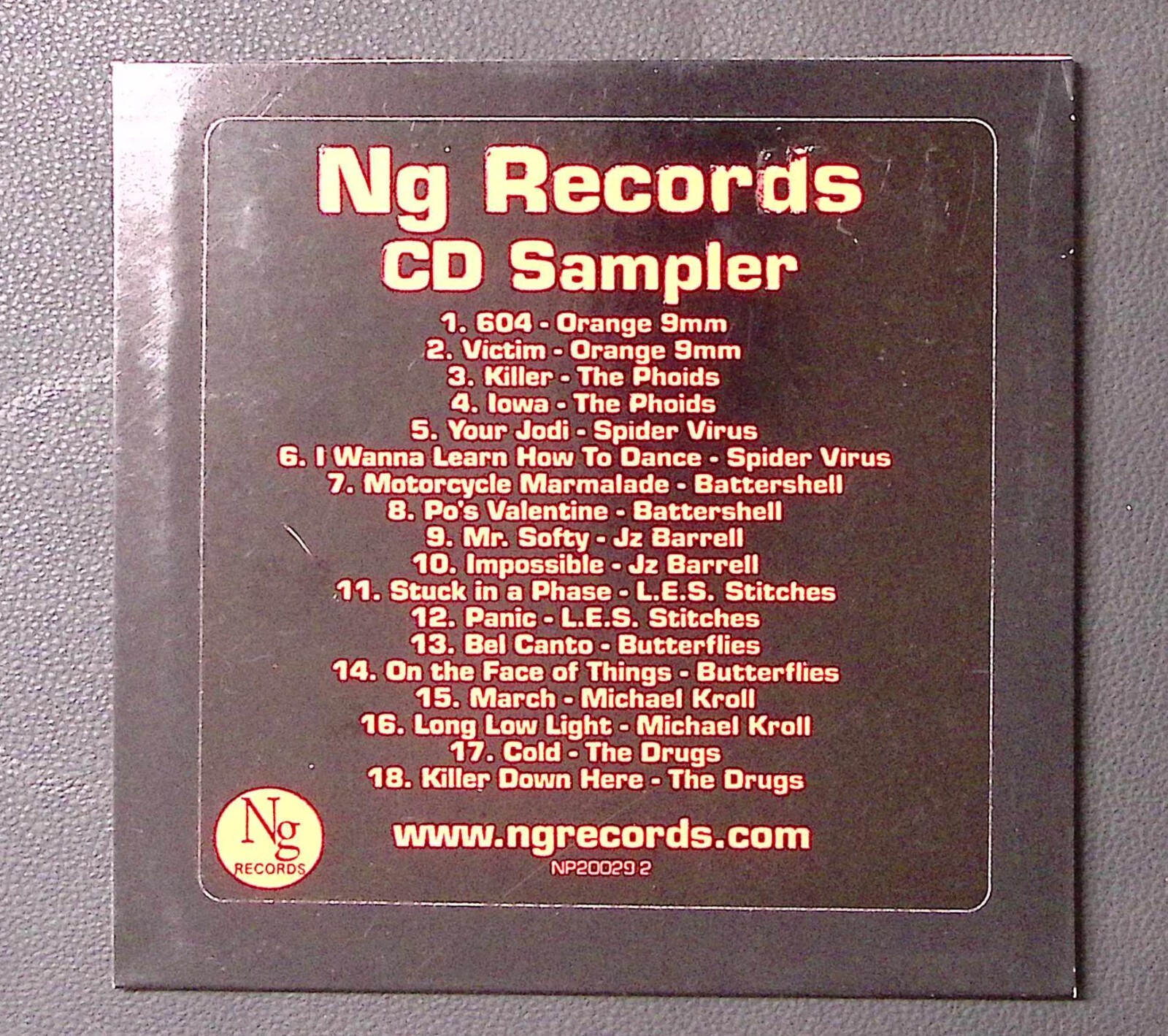 NG RECORDS CD SAMPLER ORANGE 9mm SPIDER VIRUS BATTERSHELL & MORE CD 1324