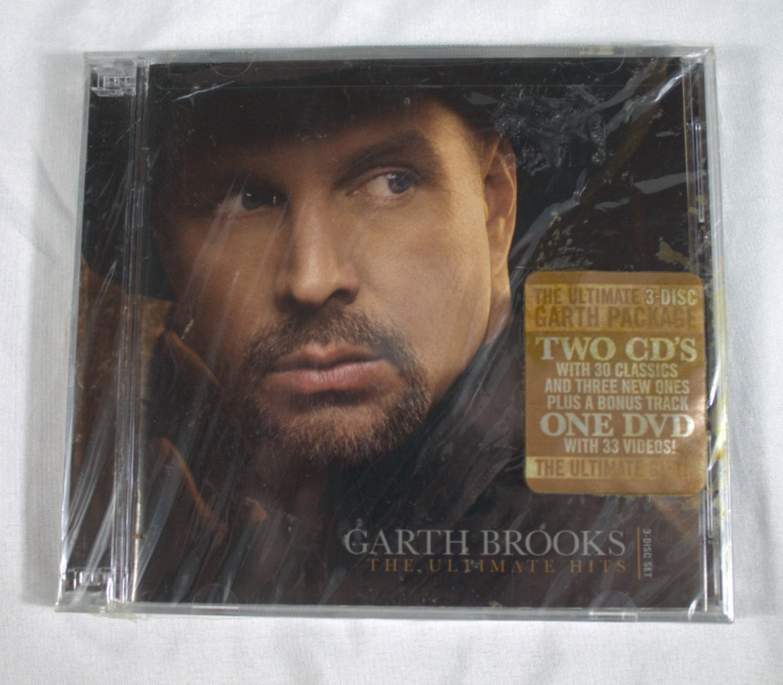 Garth Brooks – The Ultimate Hits 3 disc set two cd’s one DVD